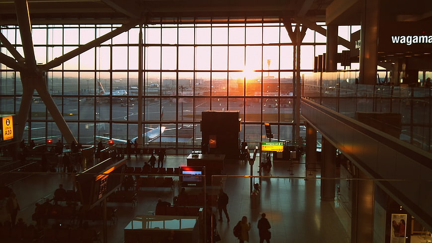 Sunset View Through Airport Terminal Windows