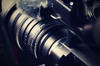 Close-up of vintage camera lens with focus rings