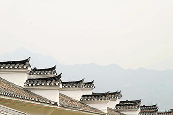 Traditional Chinese Hui-style Architecture with White Walls and Black Tile Roofs