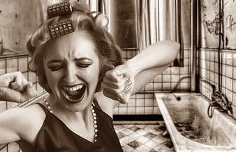 Vintage woman screaming in retro bathroom with hair rollers