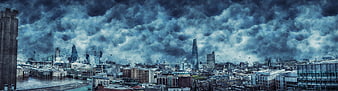 Dramatic Storm Clouds Over London City Skyline