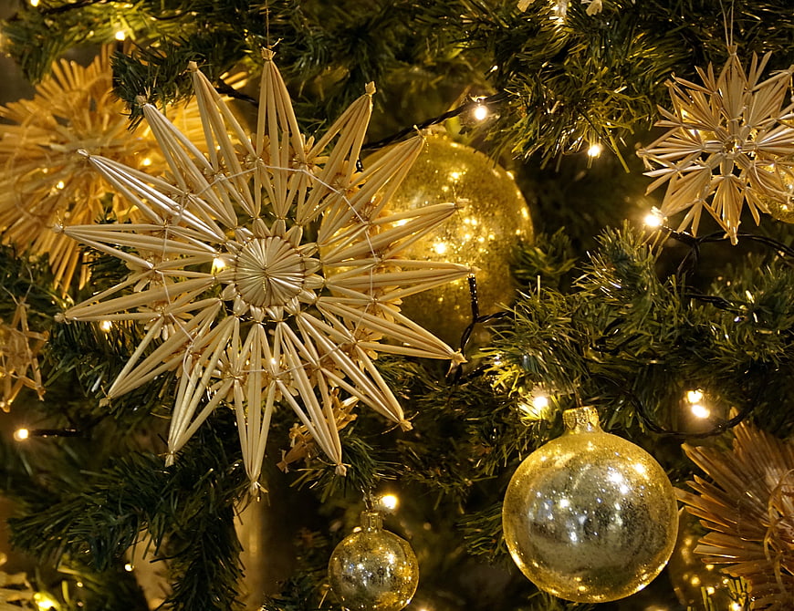 Gold Straw Stars and Ornaments on Christmas Tree
