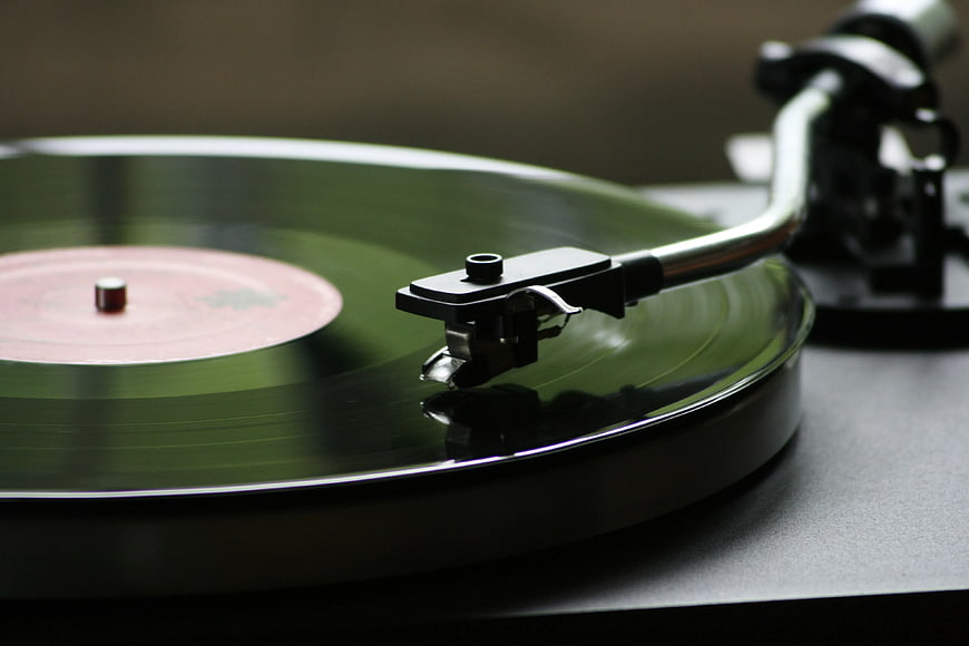 Close-up of vinyl record playing on turntable