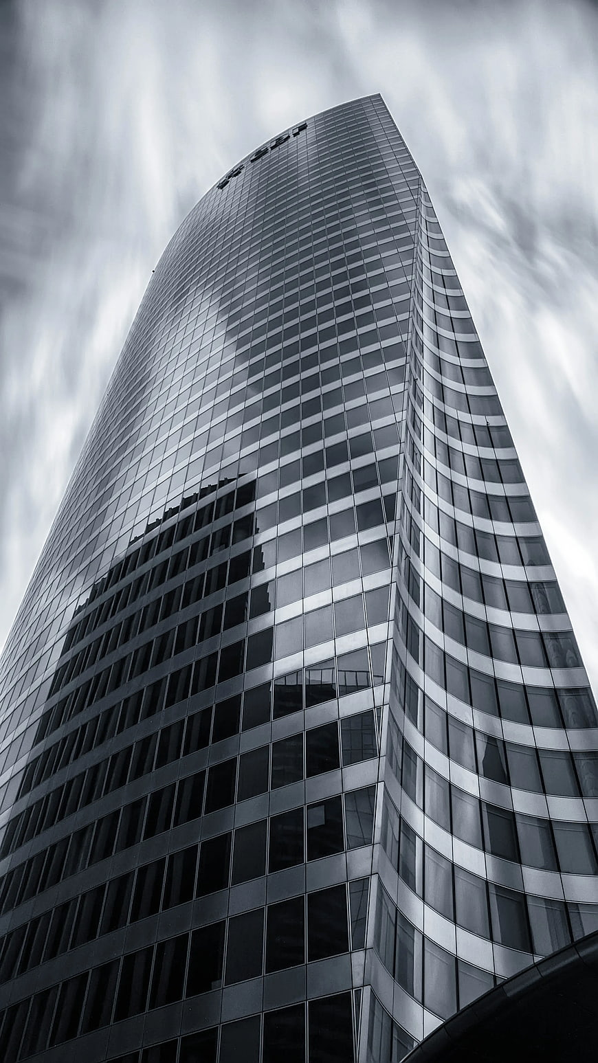 Low Angle View of Modern Glass Skyscraper