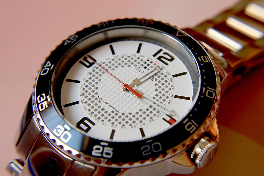 Close-up of Tommy Hilfiger Watch with White Dial and Black Bezel