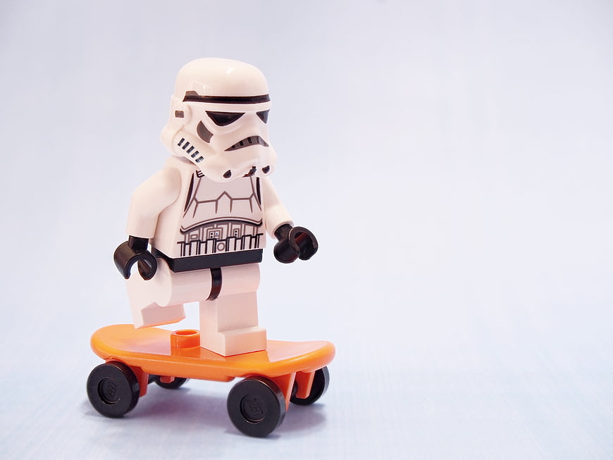Lego Stormtrooper Minifigure on Orange Skateboard Toy