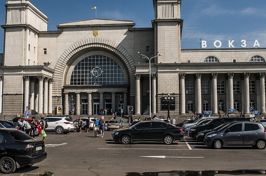 Kharkiv Railway Station Exterior with Cars and Pedestrians