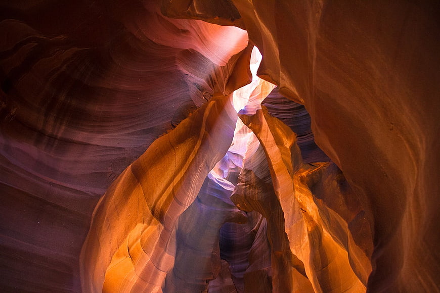 Sunlight streaming through Antelope Canyon sandstone walls