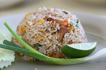 Close-up of Thai Crab Fried Rice with Lime and Scallions