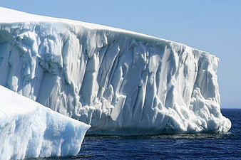 Massive Tabular Iceberg Floating in Arctic Ocean