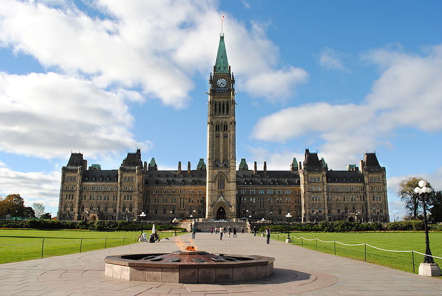 Parliament Hill Ottawa Canada with Peace Tower and National Flag of Canada