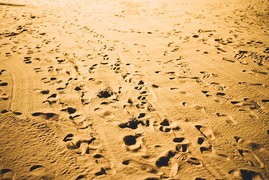 Golden Sand Footprints Beach Shore Texture Background