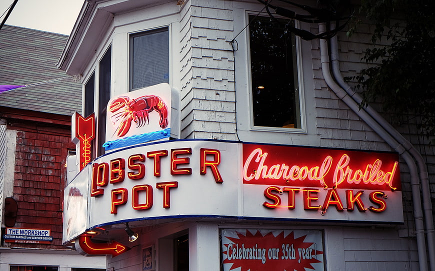 Lobster Pot Restaurant Neon Sign with Charcoal Broiled Steaks