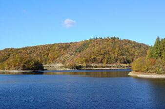 Serene Autumn Lake Landscape with Colorful Forest Hills