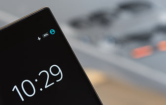 Smartphone Screen Showing Flight Mode Icon and Time