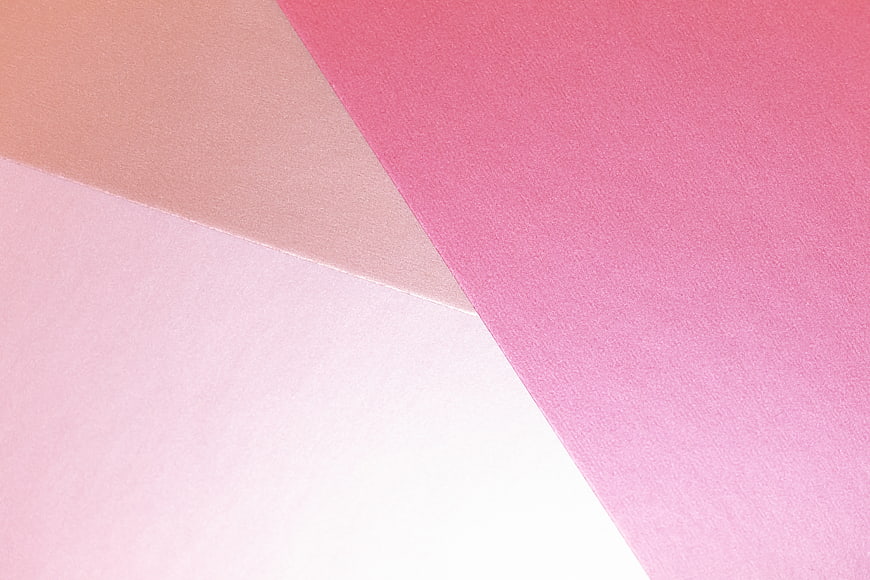 Abstract pastel pink paper texture background with diagonal composition