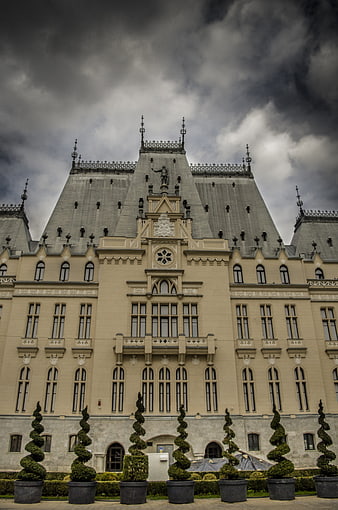 Dramatic Gothic Revival Castle Under Stormy Sky