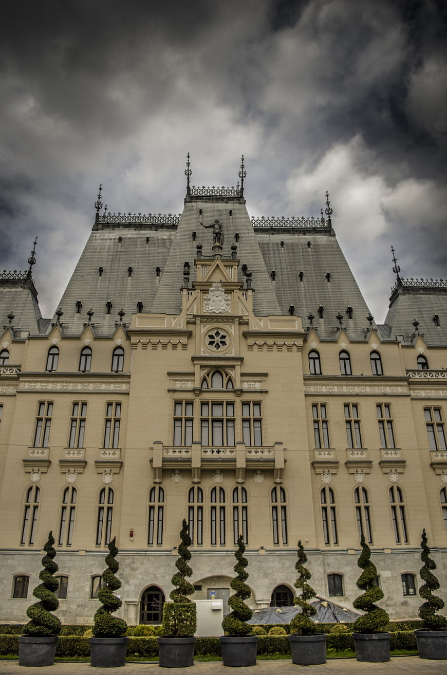 Dramatic Gothic Revival Castle Under Stormy Sky