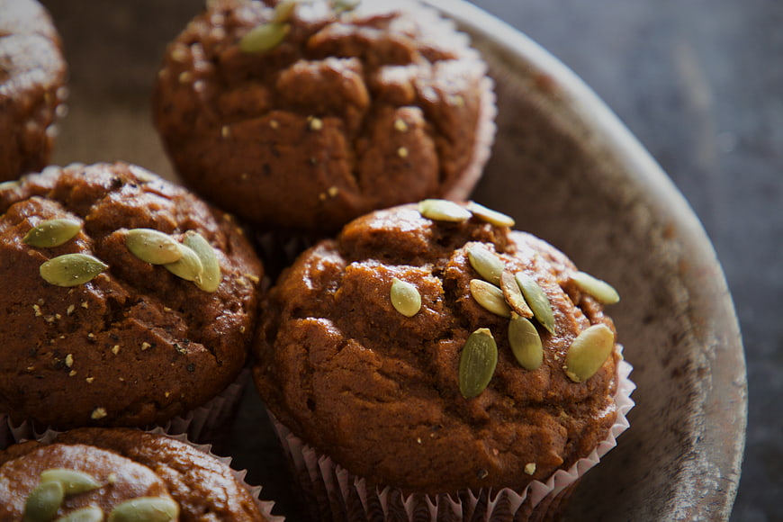 Close-up of homemade pumpkin muffins with seeds
