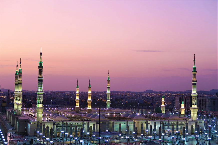 Prophet's Mosque in Medina at Twilight with Illuminated Minarets