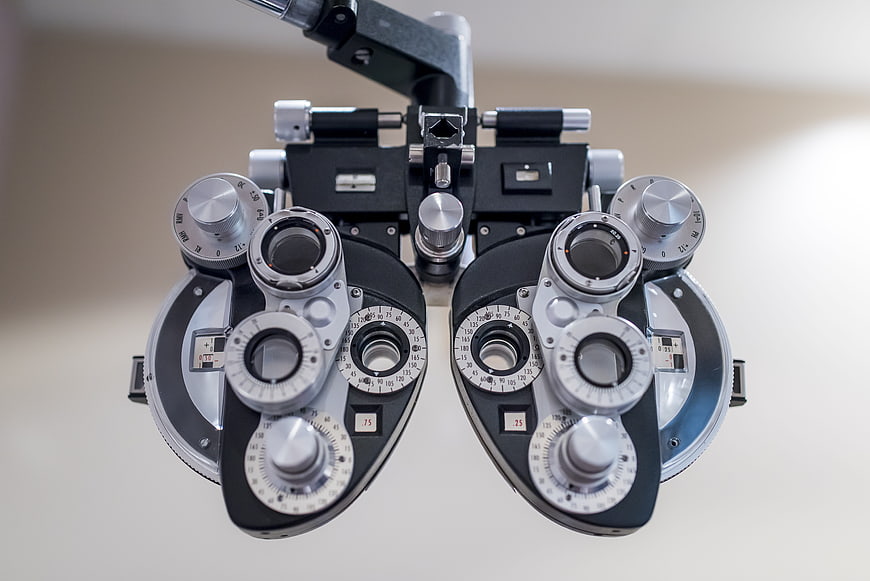 Close-up of a professional phoropter used for eye examinations in an optometry clinic