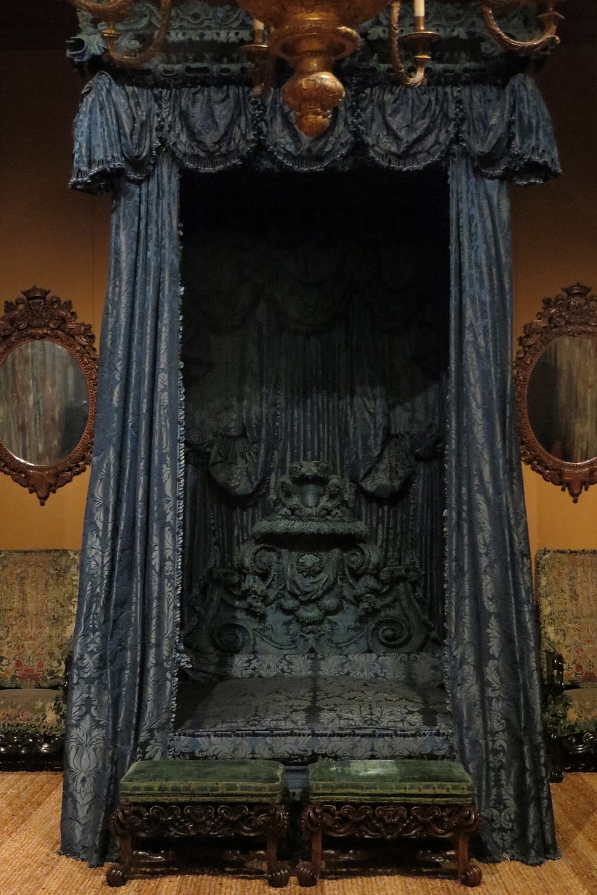 Antique Blue Canopy Bed in Historic Palace Interior