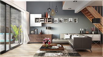 Modern living room interior with gray sofa and wooden staircase