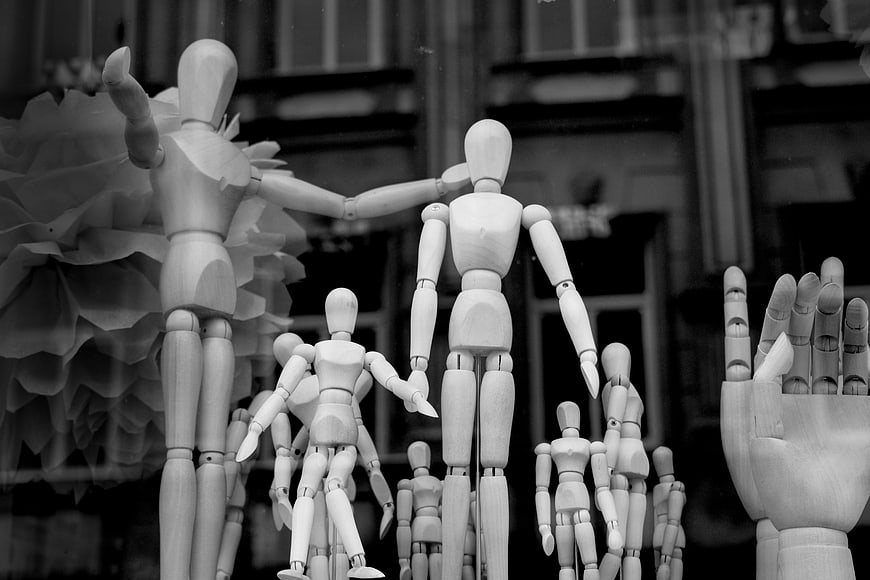 Black and white wooden artist mannequins family group