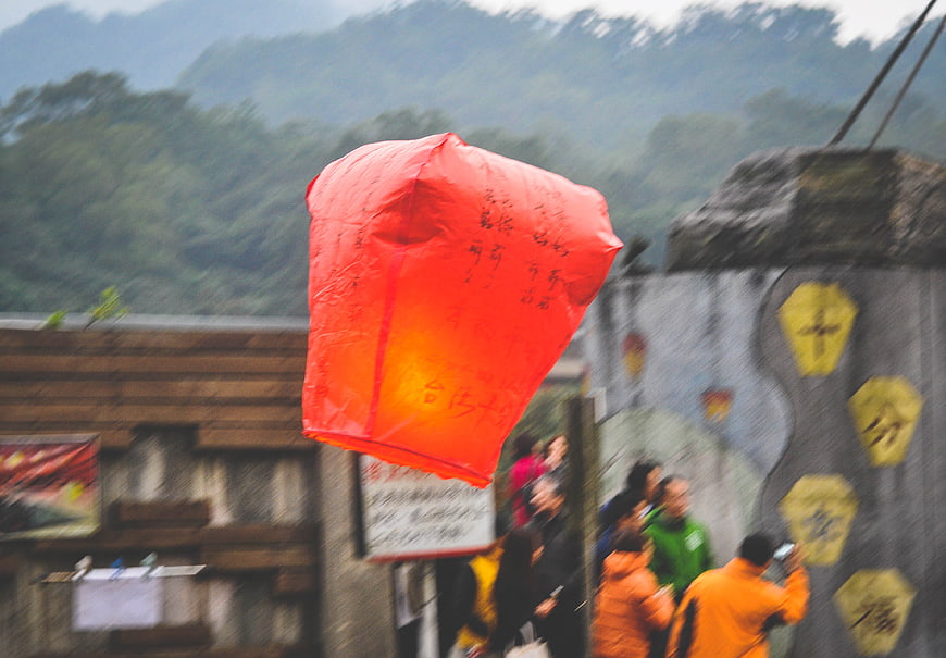 Red Sky Lantern Flying Over Shifen Old Street Taiwan