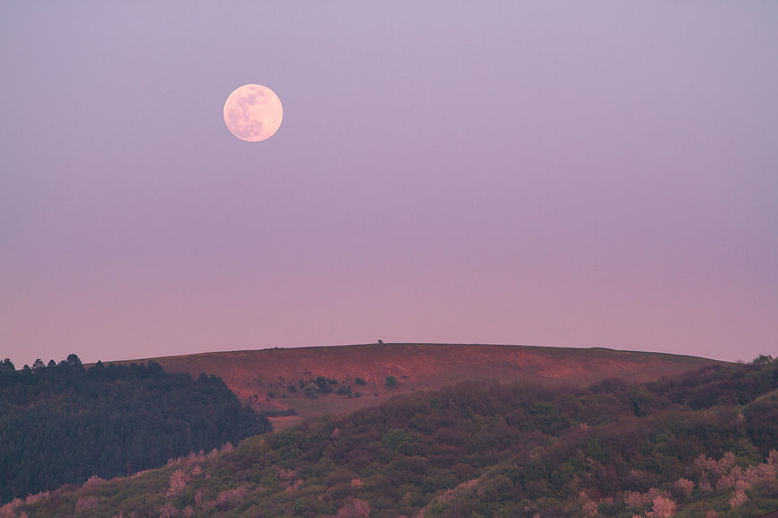 Full Moon Over Rolling Hills at Dusk