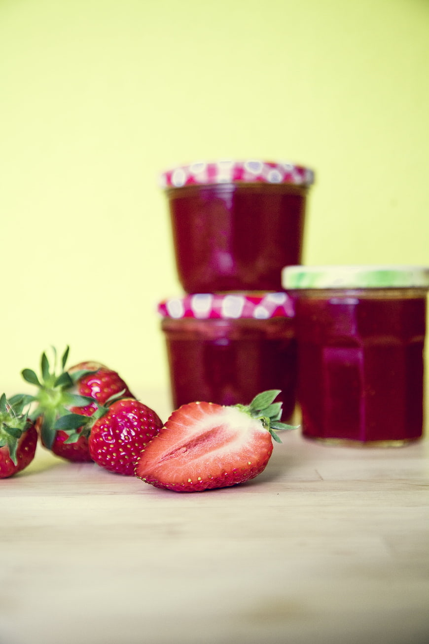 Fresh Strawberry Jam Jars with Whole and Sliced Berries