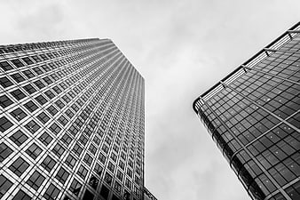 Black and white low angle view of modern skyscrapers