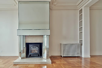 Modern Glass Fireplace with Wood Floor Interior