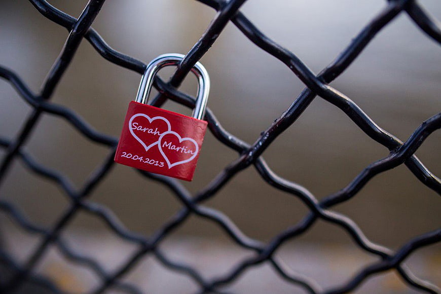 Red Love Padlock on Chain Link Fence