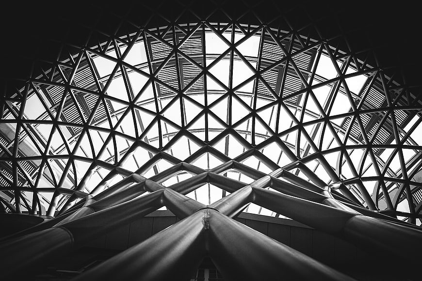 Black and white architectural dome structure with geometric patterns