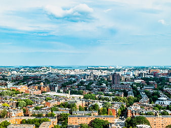 Aerial View of Boston Cityscape with Blue Sky