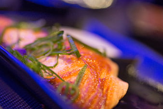 Close-up of Grilled Salmon with Green Garnish