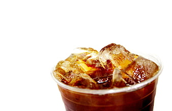 Iced Americano Coffee in Clear Plastic Cup with Ice Cubes