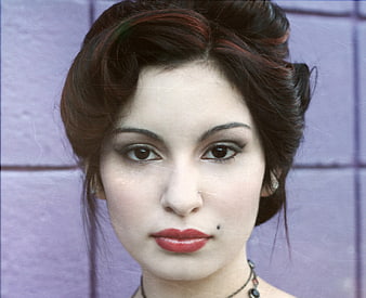 Vintage Portrait of Woman with Retro Hairstyle and Red Lips