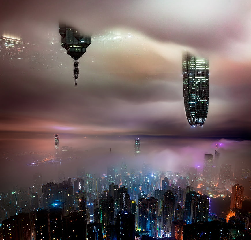 Aerial Night View of Hong Kong Skyline Emerging from Thick Fog