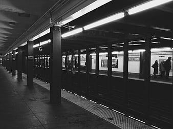 Black and white photo of Fulton Street subway station platform