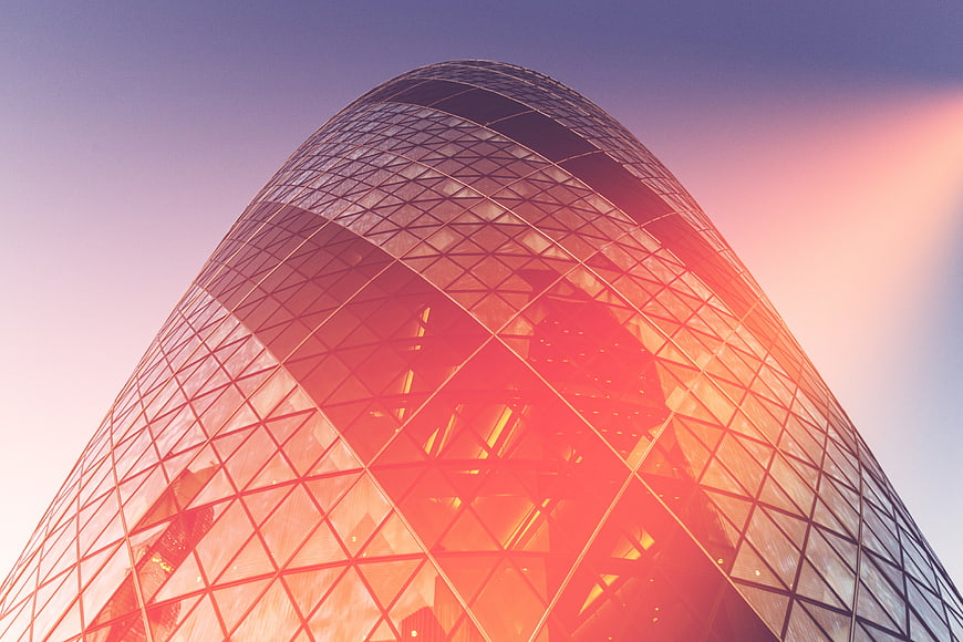 Low angle view of The Gherkin skyscraper in London