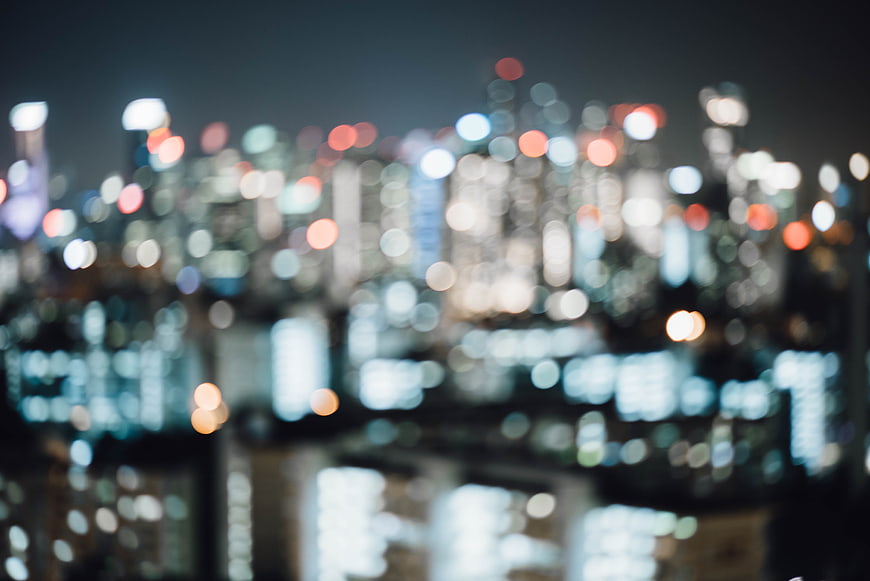 Abstract blurred city lights bokeh background at night