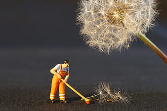 Miniature Worker Figurine Sweeping Dandelion Seeds