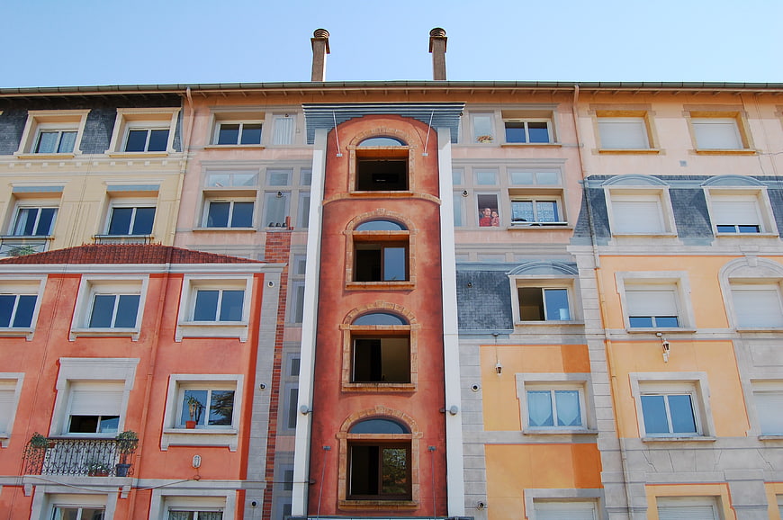 Colorful European Apartment Building Facade with Arched Windows