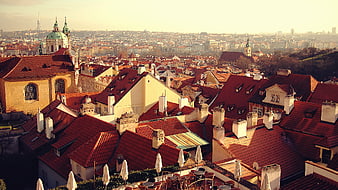 Panoramic View of Prague Rooftops at Golden Hour