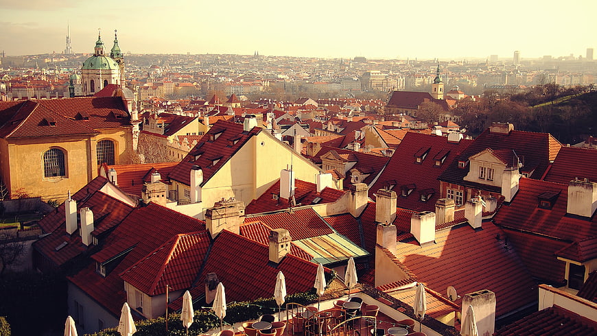Panoramic View of Prague Rooftops at Golden Hour