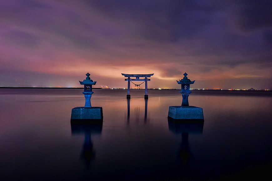 Nagao Shrine Torii Gate and Stone Lanterns at Dusk in Kumamoto, Japan