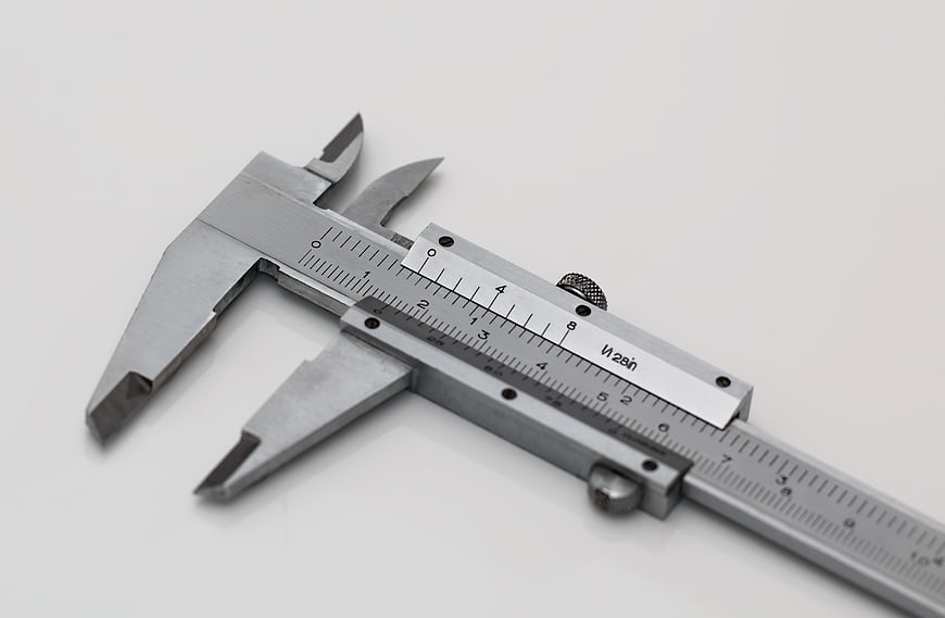 Precision Stainless Steel Vernier Caliper On White Background