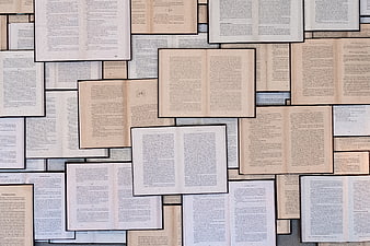 Collage of Open Books with Text Pages Background